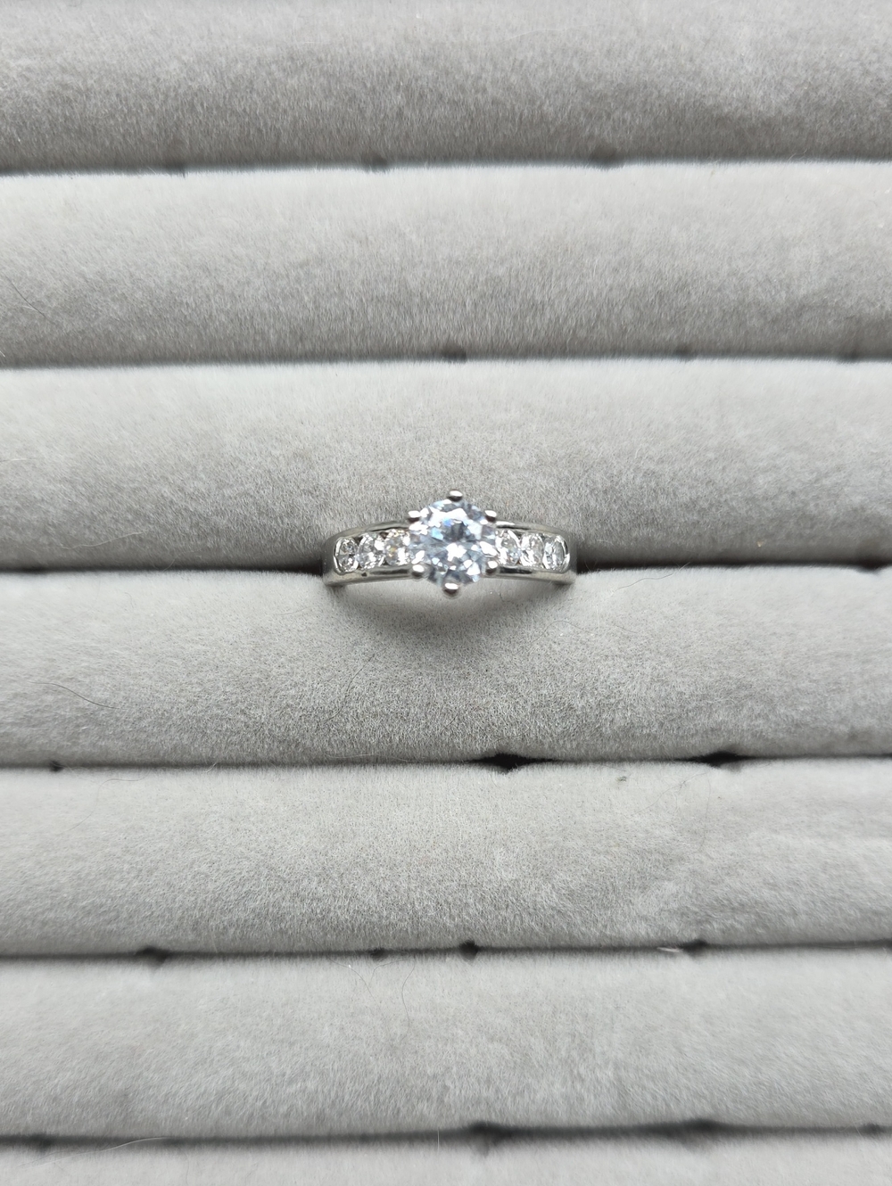 Classic Silver Solitaire Engagement Ring with Side Stones - White